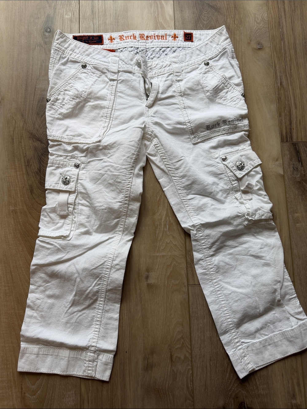 Rock Revival woman’s White Relaxed Cargo Jeans Size 27